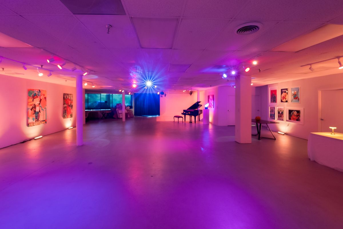Open dance floor with colored uplighting at Savoy Venue